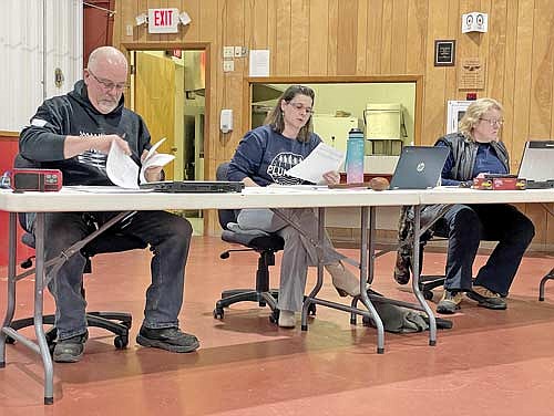 Plum Lake town board members Kevin Rasmussen, Jackey Postuchow and Jona Eliason at the April 9 meeting of the town board. (Photo by Brian Jopek/Lakeland Times)