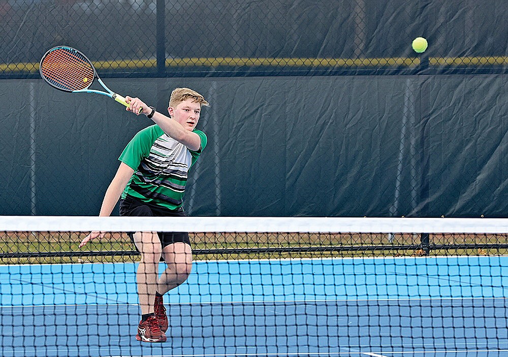 Rhinelander’s Payton McCue hits a return during a non-conference boys’ tennis dual against D.C. Everest in Weston Friday, April 12. McCue went 4-0 for the Hodags over the weekend in Wausau, playing at three different flights. (Bob Mainhardt for the River News)