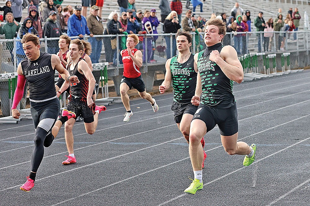 Rhinelander’s Zach Germain, right, and Payton Campbell, middle, race Lakeland’s Talon Haling in the 100-meter dash during the Hodag Hybrid Invite track meet at Mike Webster Stadium Thursday, April 11. Germain, Haling and Campbell finished 1-2-3 in the event. (Bob Mainhardt for the River News)