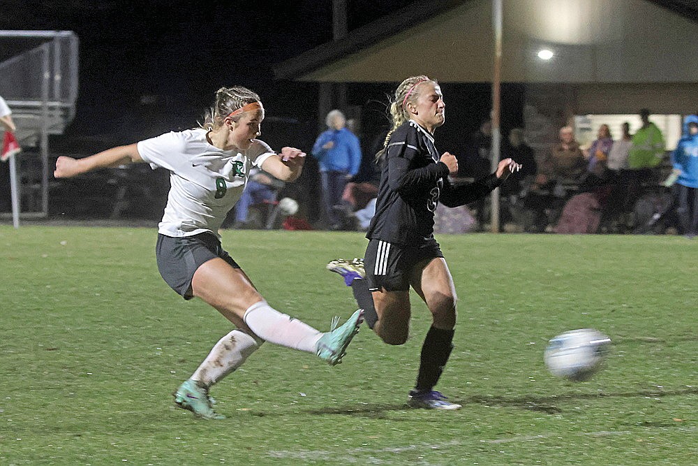 Rhinelander’s Sophie Miljevich fires a shot past Mosinee’s Livi Freiboth during the second half of a GNC girls’ soccer game at Mosinee Thursday, April 11. Miljevich scored the game-clinching goal on the shot as the Hodags defeated the Indians, 9-1. (Jeremy Mayo/River News)