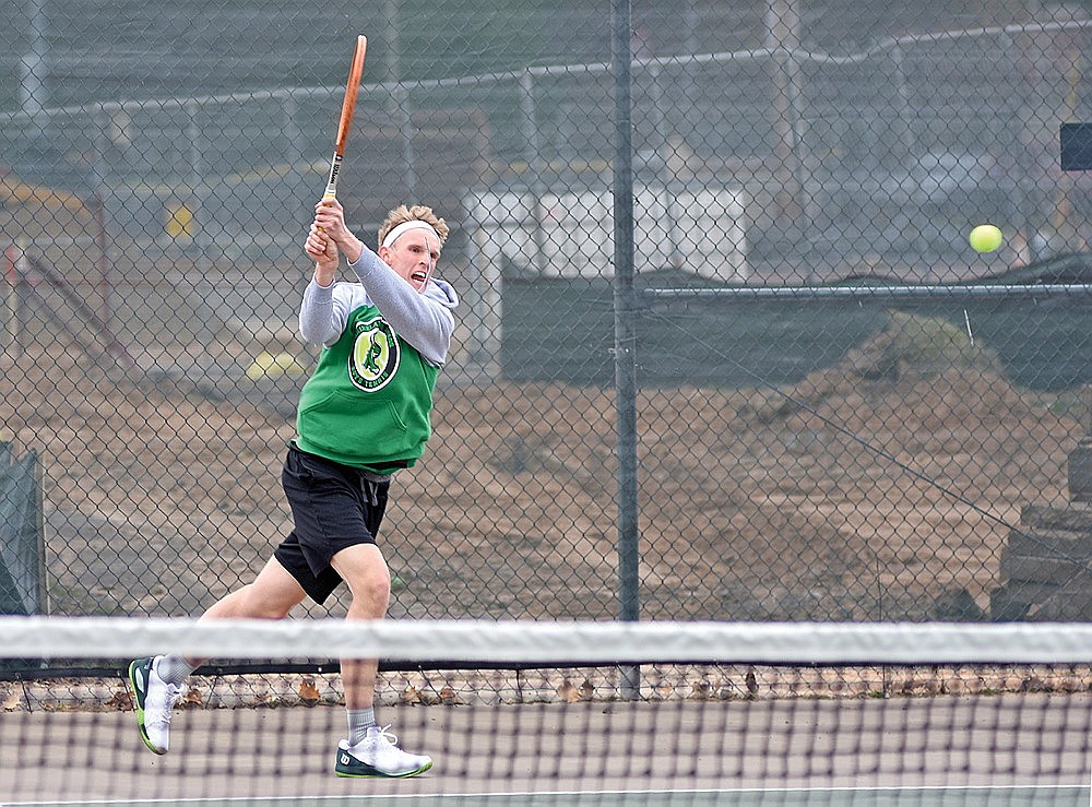 Rhinelander’s John Currie hits a return during a GNC boys’ tennis match against Lakeland in Minocqua Tuesday, April 16. Currie defeated Lakeland’s Dominic Gironella in the top singles flight 7-6 (5), 6-2 as the Hodags secured a 5-2 victory in the dual. (Brett LaBore/Lakeland Times)