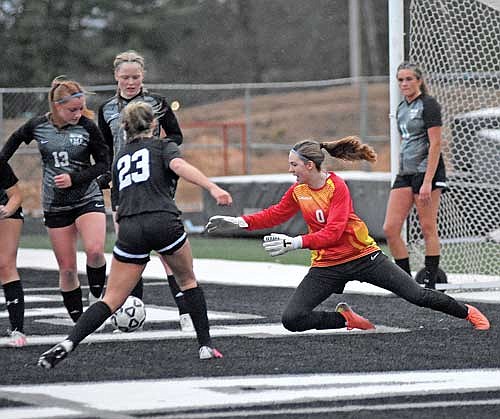 Ava Evenhouse dives to the turf for a save in the second half against Wausau West Tuesday, April 16 at IncredibleBank Field in Minocqua. Evenhouse recorded 19 saves. (Photo by Brett LaBore/Lakeland Times)