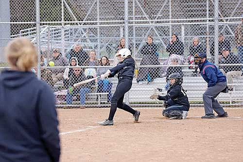 Sarah Barton hits a three-run home run in the third inning of a 21-0 win over Rhinelander Tuesday, April 16 at Musson Field in Rhinelander. Barton also hit a grand slam in the first inning as part of her career-high nine RBIs. (Photo by Bob Mainhardt for the River News)