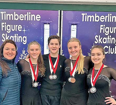 Coach Heidi Strosahl and skaters, from left, Kailynn Hanse, Nick Theis, Grace Redenbaugh and Shyann Boos placed third out of 15 teams at the low level. It’s the highest Lakeland’s ever finished at the level. (Contributed photograph)