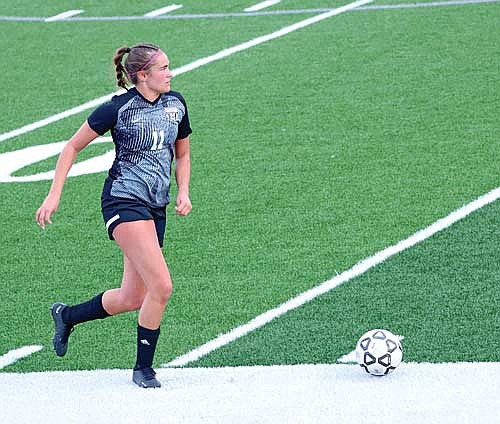 Charley Cleveland possesses the ball during the second half of a 1-0 win over Mosinee Thursday, April 18 at IncredibleBank Field in Minocqua. Cleveland was part of a Lakeland defense that shut out Mosinee. (Photo by Kate Reichl/Lakeland Times)