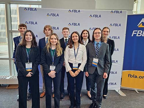 Pictured are the Rhinelander High School students who participated in the Future Business Leaders of America (FBLA) State Leadership Conference. In the front row, from left to right, are Cassie Burke, Alyssa Smits, Eva Hetland and Lucas Haselton. In the back row are Greyson Gremban, Aiden Ostermann, Payton McCue, Claire Caselton and Kate Ripple. (Submitted photo)