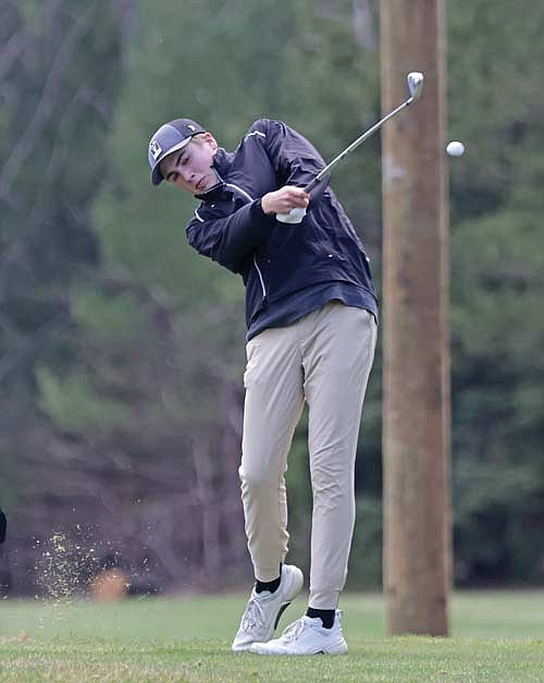 Davis Kock tees off at the second hole of the first GNC Meet Tuesday, April 23 at Inshalla Country Club in Tomahawk. (Photo by Jeremy Mayo/River News)