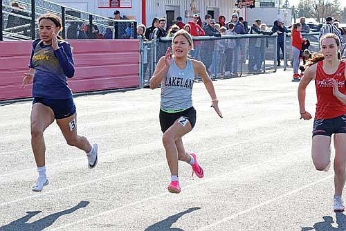 Summer Smith runs the 100-meter dash during the Medford Meet Tuesday, April 23 at Raider Field in Medford. Smith finished 10th with a time of 14.50. (Photo by Matt Frey/Star News)