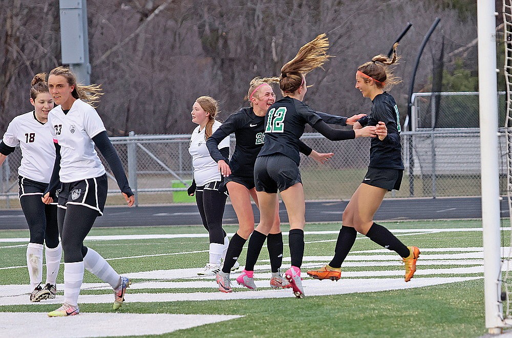 Rhinelander’s Lindsey Hoerchler, right, Leah Jamison, center, and Vivian Lamers, left, celebrate a goal scored by Hoerchler during the first half of a GNC girls’ soccer game against Antigo at Mike Webster Stadium Tuesday, April 23. Hoerchler scored three times in the game as Rhinelander won, 17-0. (Bob Mainhardt for the River News)