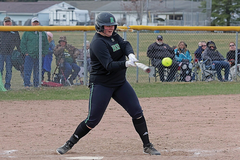 Rhinelander’s Libbey Buchmann hits a double during the fourth inning of a GNC softball game at Tomahawk Tuesday, April 23. Buchmann scored later in the inning, but the Hodags fell to the Hatchets, 12-1. (Jeremy Mayo/River News)