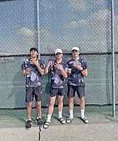 Players, from left, Dominic Gironella, Jack Stepec and Mika Rempp pose for a photo after their tennis matches at the Washington County Meet Saturday, April 27 at Slinger High School. Rempp finished second at No. 3 singles, Stepec third at No. 2 singles and Gironella fifth at No. 1 singles. (Contributed photograph)