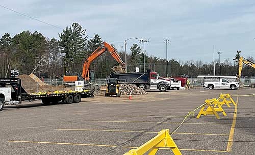 Construction work being done to improve Lakeland Union High School’s practice football field, west-side parking lot, bleachers and press box on Friday, April 26, in Minocqua. (Photo by Trevor Greene/Lakeland Times)