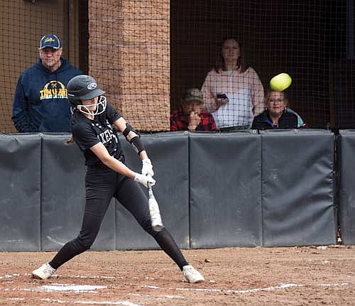 Malia Newport drives the ball to right field in the first inning of a 5-0 win over Tomahawk Monday, April 29 at Lenz Field in Minocqua. Newport scored two runs on the play. (Photo by Brett LaBore/Lakeland Times)