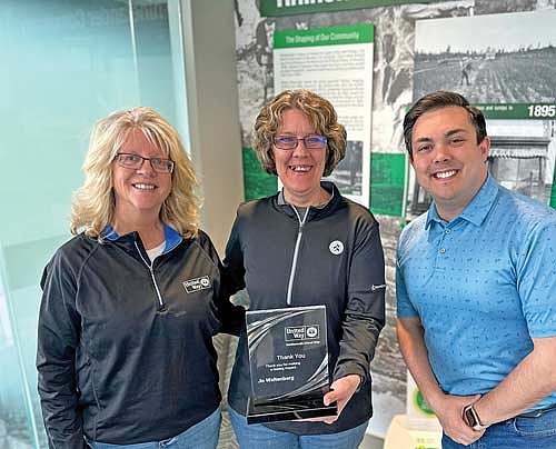 Outgoing Northwoods United Way board member Jo Waltenberg, center, is pictured with executive director Nancy Sattler and board member Russell Myers. Waltenberg was thanked for her nine years of service on the NWUW board of directors. Todd Schmieding was also recognized for his years of service. (Submitted photo)