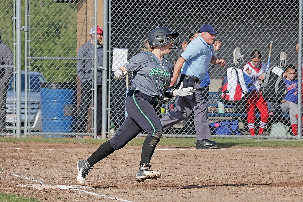 Rhinelander’s Lucy Lindner rounds first on her way to a double during the third inning of a GNC softball game against Northland Pines in Eagle River Tuesday, April 30. Lindner collected three hits in the game for Rhinelander. (Jeremy Mayo/River News)