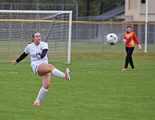 Bryn Warchol kicks the ball up the field during the second half against Hayward Thursday, May 2 at Heidi Friermood Field in Hayward. (Photo by Brett LaBore/Lakeland Times)