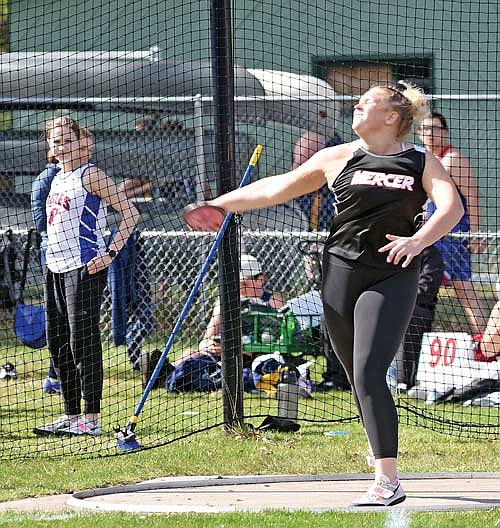 Eiley Schoeneman throws the discus during the Lakeland Invite Tuesday, April 30 at IncredibleBank Field in Minocqua. Schoeneman won the discus and shot put. (Photo by Brett LaBore/Lakeland Times)