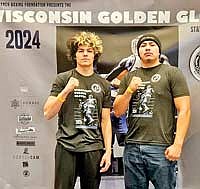 Alex Brisk, left, and Walter Linklater Jr. competed for Lac du Flambeau at the Wisconsin Golden Gloves state tournament March 29-30 at Madison Marriott West in Middleton. Linklater Jr. won the state title in the Novice division at the 203-plus weight class. (Contributed photograph)