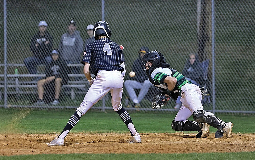 Rhinelander catcher Adrian Patrone attempts to block a pitch in the dirt during the sixth inning of the second game of a GNC doubleheader against Lakeland at Stafford Field Friday, May 3. Lakeland scored the tying and go-ahead runs on wild pitches in the sixth inning of Game 2 as they swept the doubleheader, 13-2 and 7-6. (Bob Mainhardt for the River News)