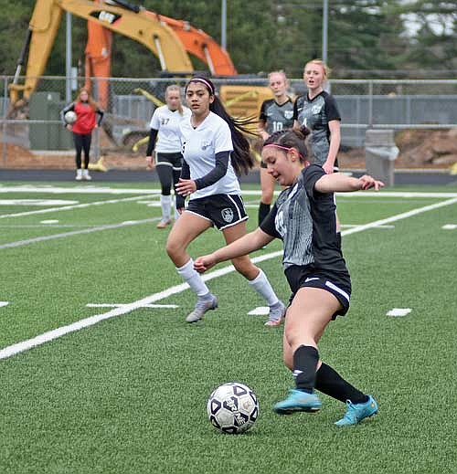 Laura Navarrete plays the ball in the first half against Antigo Tuesday, May 7 at IncredibleBank Field in Minocqua. (Photo by Brett LaBore/Lakeland Times)