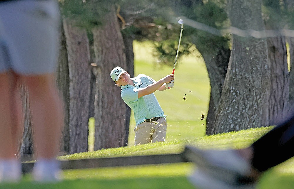 Rhinelander’s Sam Schoppe hits his second shot on the par-5 first hole at Rhinelander Country Club during a Great Northern Conference golf meet Monday, May 6. Schoppe shot 76 to finish in a three-way tie for second on the day. (Jeremy Mayo/River News)