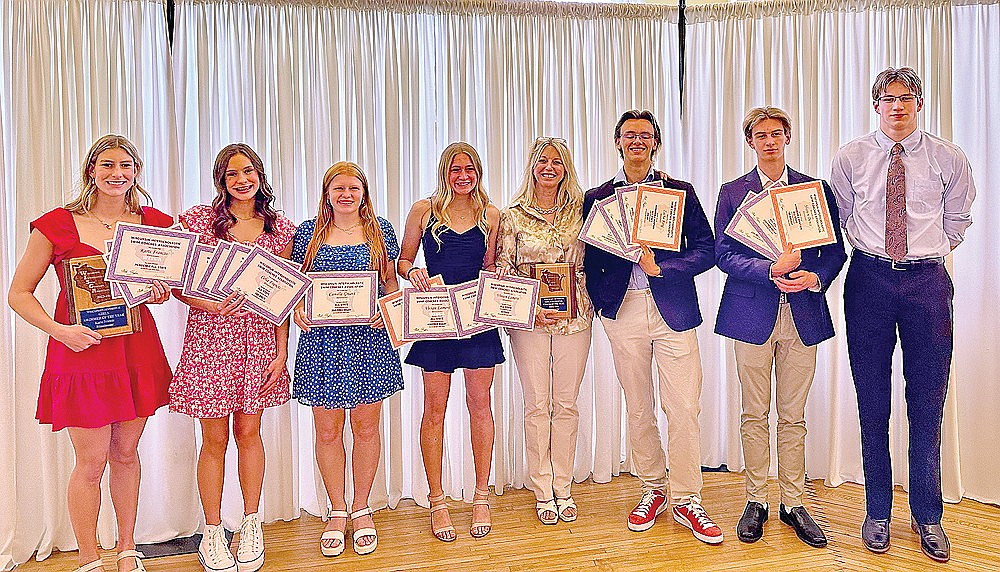 Rhinelander High School swim team award winners and all-state honorees pose for a photo following the Wisconsin Interscholastic Swim Coaches Association banquet in Hartford Sunday, May 5. Pictured, from left to right, are Karis Francis, Celia Francis, Millie Gruett, Vivian Lamers, coach Jenny Heck, Zacha King, Shawn Denis and Matthias Fugle. All-state honorees Abi Winnicki, Ellyse Younker, Lily Thorsen, Dolan O’Malley, Brock Arrowood and Samson Shinners were unavailable for the photograph. (Submitted photo)