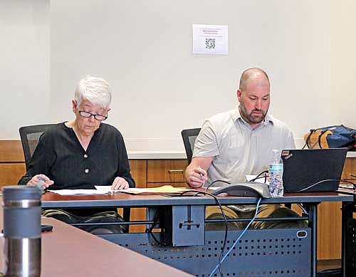 Vilas County forestry, recreation and land committee chair Holly Tomlanovich and county forest administrator Chad Keranen discuss the future of the equestrian campground. (Photo by Beckie Gaskill/Lakeland Times)