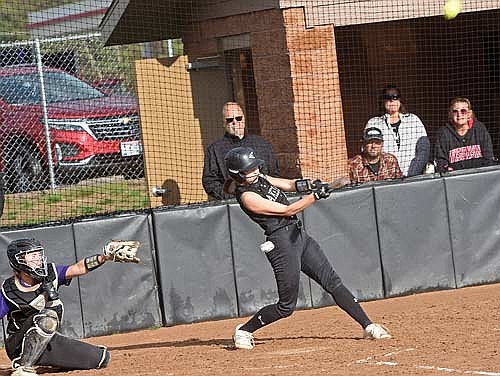 Lani Frisch hits a sacrifice fly in the fifth inning against Mosinee Friday, May 10 at Lenz Field in Minocqua. Two runs came home to score to tie the game at 2-2. (Photo by Brett LaBore/Lakeland Times)