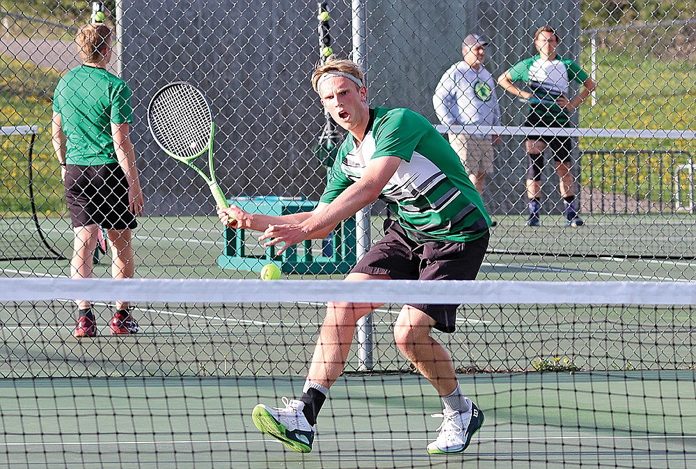 Rhinelander’s John Currie hits a return during a GNC boys’ tennis match at Medford Wednesday, May 8. Currie defeated Medford’s Brayden Balciar at No. 1 singles in a pair of set tiebreakers to finish 5-0 in conference dual meet play. (Matt Frey/Star News)