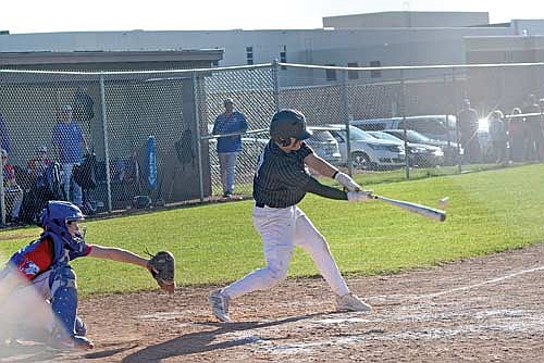 Merick Trotter singles home a run in the fourth inning of a 6-4 win over Northland Pines Tuesday, May 14 at Northland Pines High School in Eagle River. (Photo by Brett LaBore/Lakeland Times)