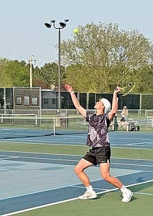 Jack Stepec prepares to serve the ball in his No. 2 singles match against Antigo Monday, May 13 at the Antigo High School tennis courts. Stepec won 6-0, 6-4. (Contributed photograph)