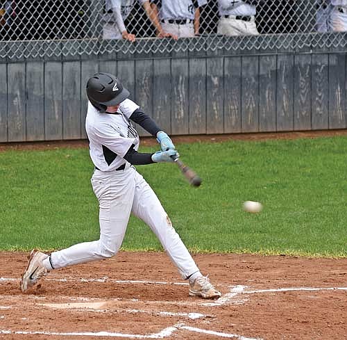 Drew Warren puts the ball in play against Northland Pines Thursday, May 16 at the Lakeland Union High School baseball field in Minocqua. (Photo by Brett LaBore/Lakeland Times)