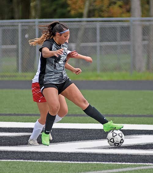 Tayiah Bauman looks for possession of the ball in the second half of a 2-0 win over Medford Thursday, May 16 at IncredibleBank Field in Minocqua. Bauman scored her first goal of the season in the second half. (Photo by Brett LaBore/Lakeland Times)