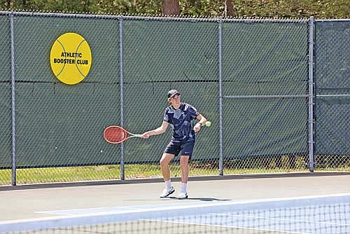 Mika Rempp hits a groundstroke in his No. 3 singles match during the Great Northern Conference Tournament Friday, May 17 at the Rhinelander High School tennis courts. Rempp won the conference championship at No. 3 singles in his first year at Lakeland. (Photo by Bob Mainhardt for the River News)