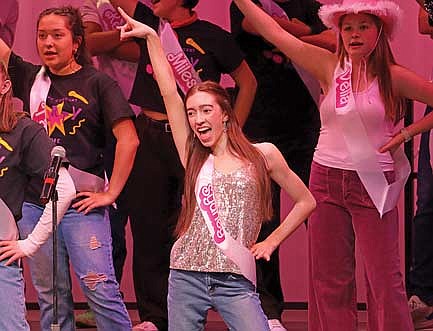 Talia Crisco, left, Sydney Pitzer and Vella Walden perform during the “Dance The Night” number at the Black and White Night of the Arts on Wednesday, May 15, at Lakeland Union High School in Minocqua. (Photo by Kate Reichl/Lakeland Times)