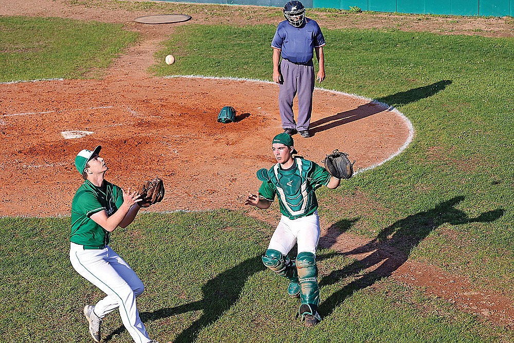 Rhinelander’s Max Ratty attempts to catch a pop up, with catcher Chandler Servent following the play, during the fifth inning of a GNC baseball game in Tomahawk Friday, May 17. Ratty was unable to make the catch on the play and Tomahawk’s Brody Hilgendorf drove in the tying run on the next pitch as the Hatchets rallied past the Hodags, 3-2. (Bob Mainhardt for the River News)