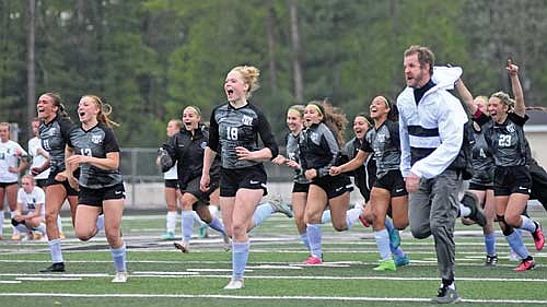 The Thunderbirds celebrate their 3-2 penalty kick shootout win over Rhinelander Tuesday, May 21 at IncredibleBank Field in Minocqua. Team pictured, from left, are Charley Cleveland, Landry Lenz, Elsa Shockley, Cale Quade, Jenna Klappa, Bryn Warchol, Laura Navarrete, Tayiah Bauman, goalie coach Jeff Fricke, Lexi Gindorff and Josie Wentland. (Photo by Brett LaBore/Lakeland Times)