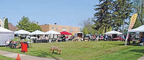 The Minocqua farmers market opened for business at its new location on the corner of Chippewa Street and East Chicago Avenue on Friday, May 17, in Minocqua. (Photo by Brian Jopek/Lakeland Times)