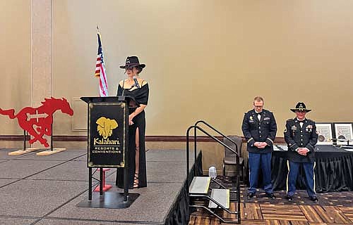 Specialist Marlee Strysiek of the Wisconsin National Guard’s 105th Cavalry Regiment speaks after being awarded the Jopek Stetson, a round-brimmed hat traditionally worn by cavalry soliders in the U.S. Army, at an annual “dine-out” held once every year or two. (Contributed photograph)