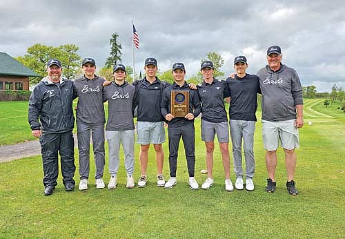 Team pictured, from left, are coach Scott Howard, Davis Kock, Lawson Bain, Jack Rubo, Matt Haggart, Gray Wagner, Jeremy Hensen and assistant coach Peter Nomm celebrate a regional championship after a WIAA Division 2 meet Tuesday, May 21 at Hidden Greens North Golf Course in Solon Springs. The Thunderbirds shot a 307 as a team. (Contributed photograph)