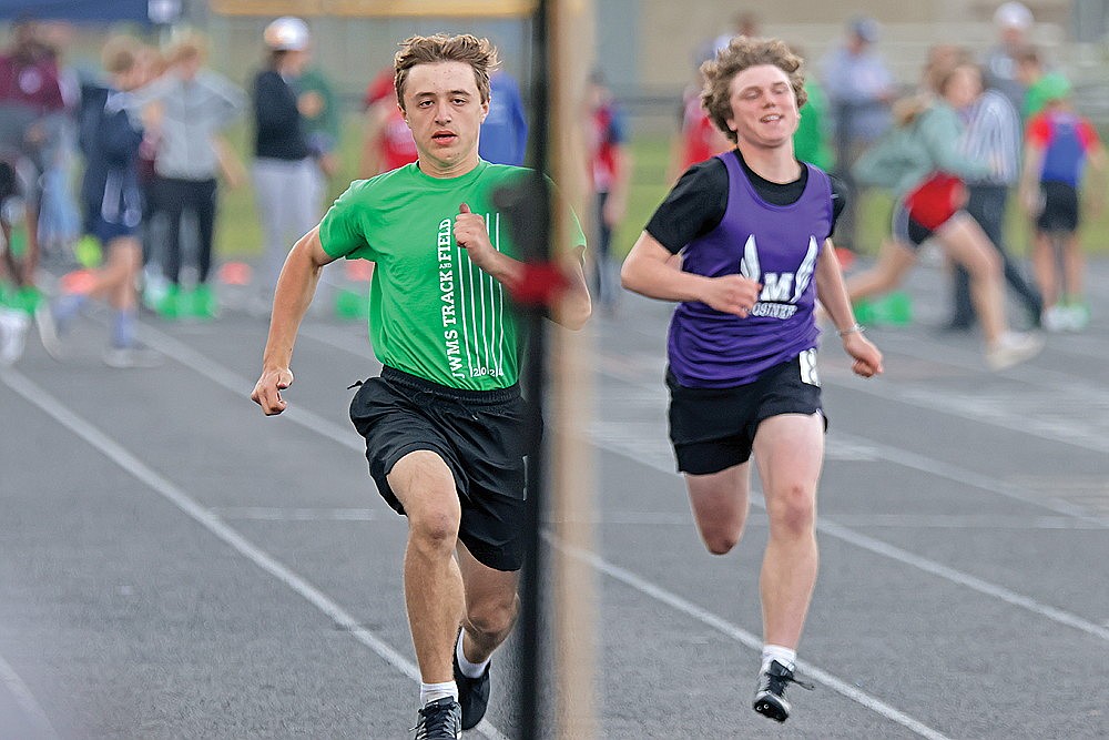 Elias Puza races in the boys’ 100-meter dash during the WVC small school meet in Tomahawk Thursday, May 16. (Jeremy Mayo/River News)