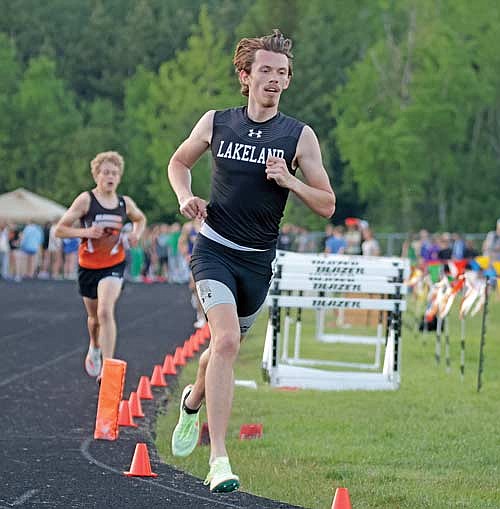 Owen Clark runs to a first-place finish in the 3,200-meter run at a WIAA Division 2 sectional meet Thursday, May 23 at Colby High School. Clark qualified to state in the 1,600-meter run as well. (Photo by Jeremy Mayo/River News)