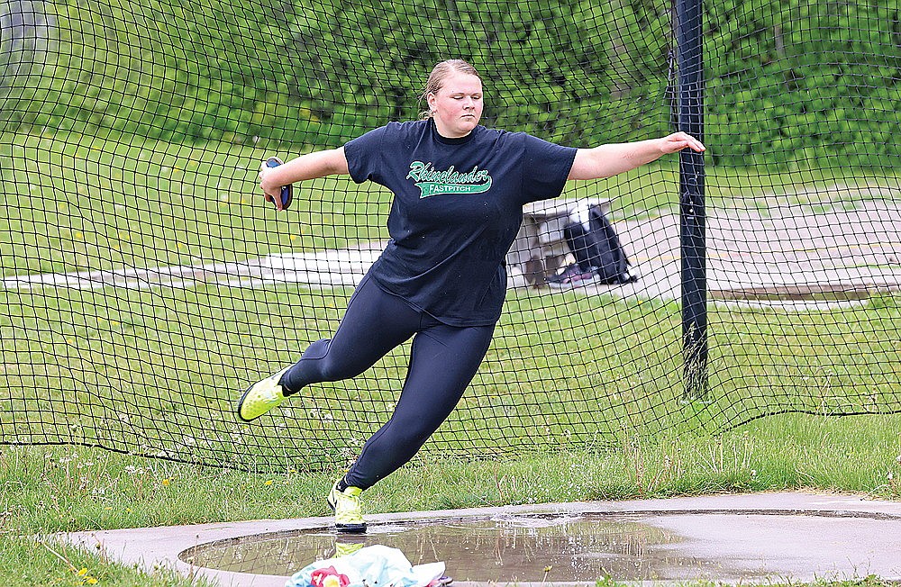 Rhinelander’s Libbey Buchmann practices the discus at Mike Webster Stadium Tuesday, May 28. Buchmann will be making her second appearance in the discus at the WIAA state meet in La Crosse on Saturday and will try to better her sixth-place finish in Division 2 in the event from last year. (Bob Mainhardt for the River News)