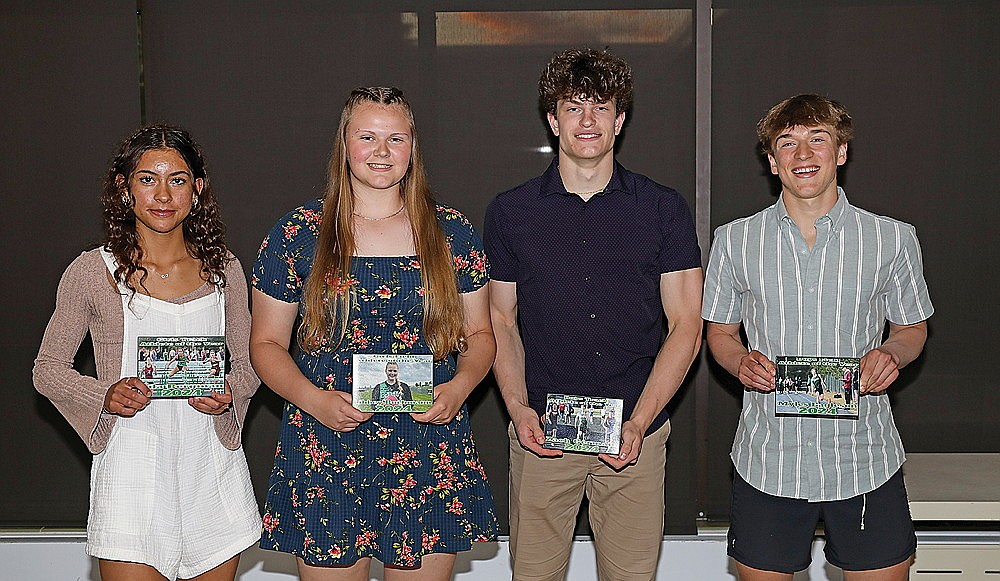 The Rhinelander High School track team athletes of the year for 2024 pose for a photograph following the team’s banquet in the RHS commons Tuesday, May 28. Pictured, from left to right, are Aila Bergman, Libbey Buchmann, Zach Germain and Myles Eagleson. The four accumulated the most points this season in either track or field events for the Hodag girls’ and boys’ teams. (Bob Mainhardt for the River News)