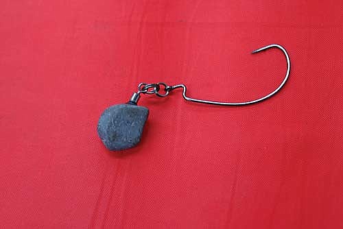 The jika rig is a presentation anglers can use when the fishing gets tough. The weight is attached to a split ring (shown here) or a snap, and then the split ring or snap is threaded through the eye of the hook. (Photo by Beckie Gaskill/Lakeland Times)