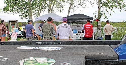 Anglers with the Wisconsin Bass Team Trail wait to see others weigh in their day’s catch at Sara Park. (Photo by Beckie Gaskill/Lakeland Times)