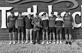 Team pictured, from left, Jeremy Hensen, Davis Kock, Lawson Bain, coach Scott Howard, Gray Wagner, Jack Rubo, Matt Haggart and assistant coach Peter Nomm celebrate their sectional championship after a WIAA Division 2 sectional meet Tuesday, May 28 at Turtleback Golf Course in Rice Lake. The Thunderbirds shot a 316 to become sectional champions for the first time since 2021. (Photo by Brett LaBore/Lakeland Times)