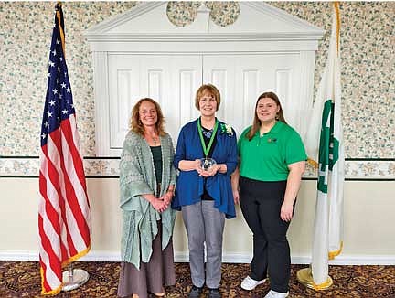 Rhinelander’s Lynn Feldman, center, was recently honored as a Wisconsin 4-H Hall of Fame laureate. (Submitted photo)