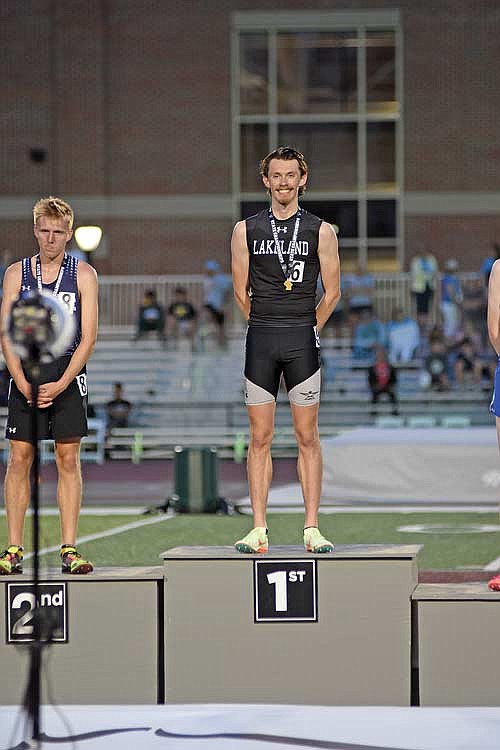 Owen Clark stands atop the podium after winning the state championship in the 3,200-meter run at the WIAA Track and Field State Championships Friday, May 31 at Veterans Memorial Stadium Complex in La Crosse. Clark is Lakeland’s first track and field state champion since Aubrey Anderson won the 800-meter run in 2018. (Photo by Brett LaBore/Lakeland Times)