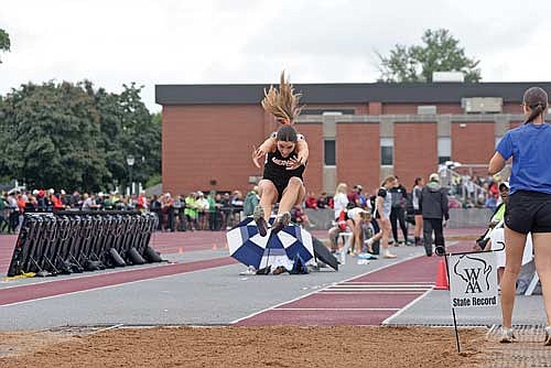 Ona Ruiz leaps into the pit during the triple jump at the WIAA Track and Field State Championships Saturday, June 1 at Veterans Memorial Stadium Complex in La Crosse. Ruiz finished fourth and made the podium with a mark of 35-5.5. (Photo by Brett LaBore/Lakeland Times)